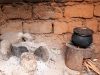 Before and after: a traditional 3-stone-fire to the left, our efficient cook stove to the right